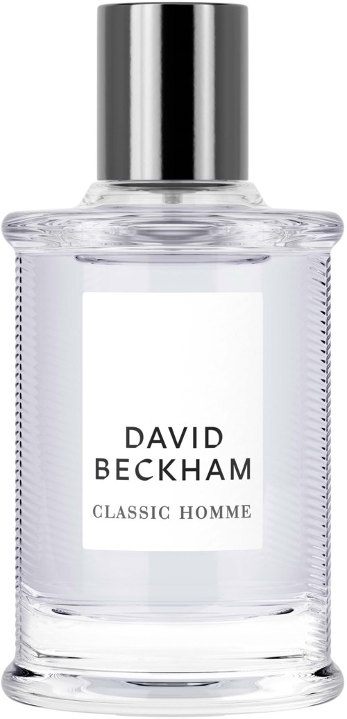 Eine klare Glasflasche mit silberner Kappe, beschriftet "David Beckham Classic Homme" für Männer.
