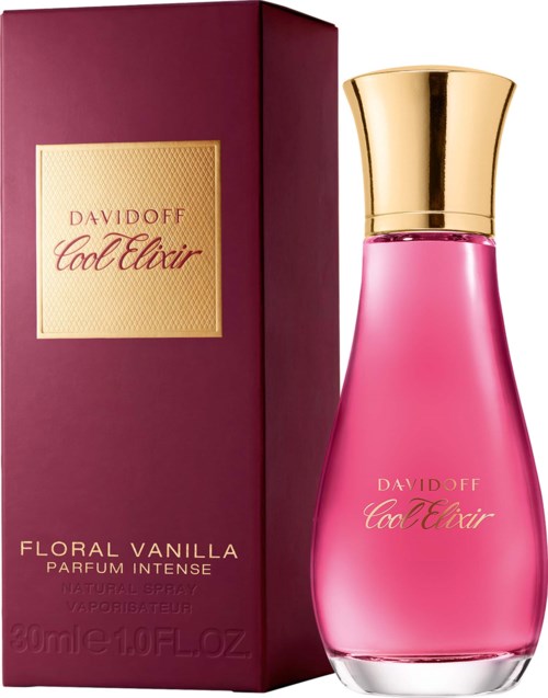 Pink floral vanilla perfume bottle with a gold cap beside its purple box label with gold and pink text.