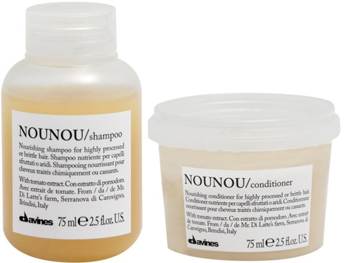 Två små behållare med Nounou schampo och balsam, vardera 75 ml, med vita lock och etiketter.