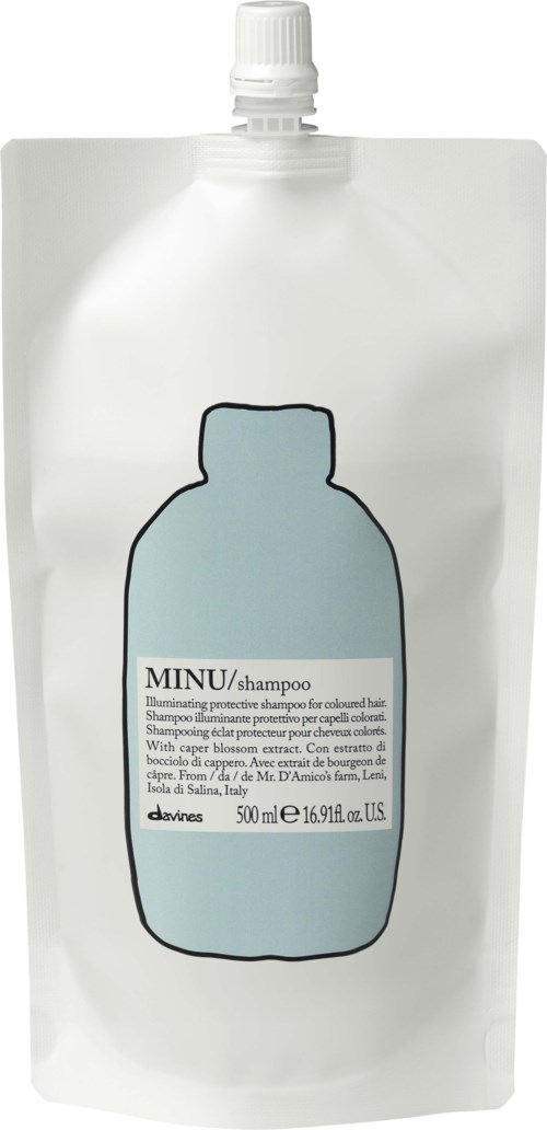 En vit påfyllnadsförpackning med en blå schampofläck och text, innehållande 500 ml schampo.