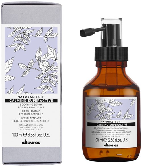 Ett lugnande serum i en brunglasflaska med spraytop, och en box med bladillustrationer och produktdetaljer.