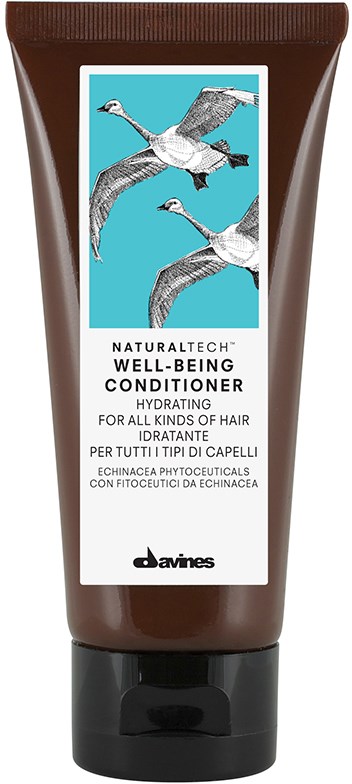 En brun tub med Davines balsam med en etikett som visar två flygande gäss och text om hårvård.