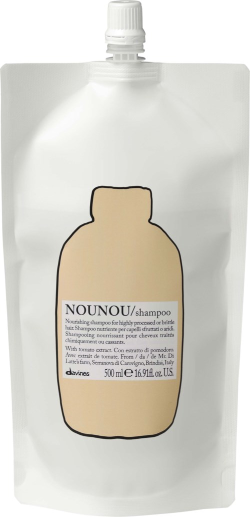En vit påfyllnadsförpackning med en beige schampopåse och textetikett. Den är från Davines, 500 ml storlek.