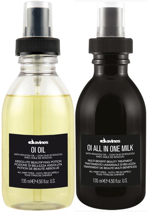 To flasker, én med lys gul olje og én med svart væske, merket som hårpleieprodukter.
