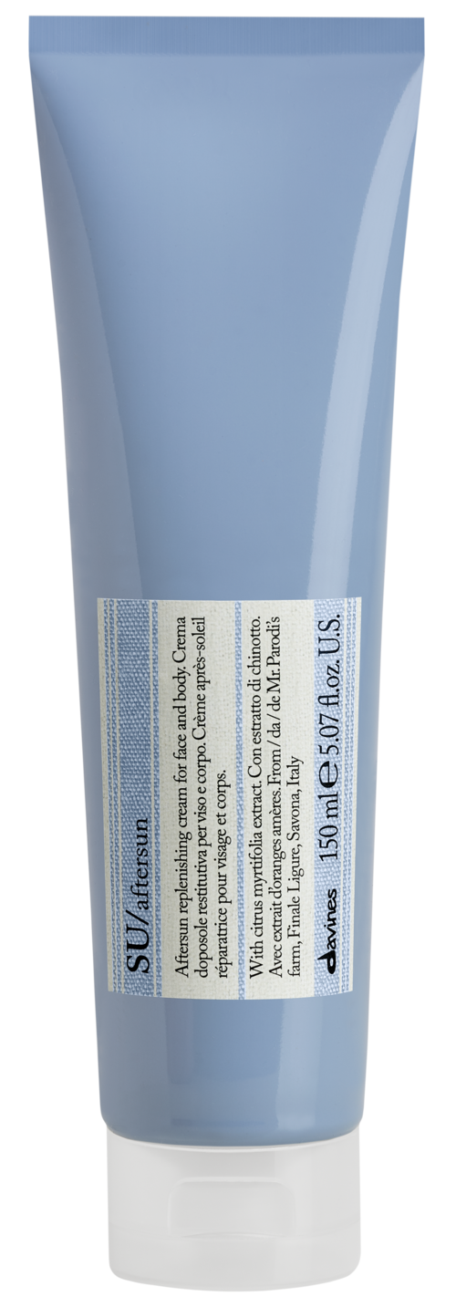 A gray tube with a label that has small text, likely a skincare or cosmetic product.