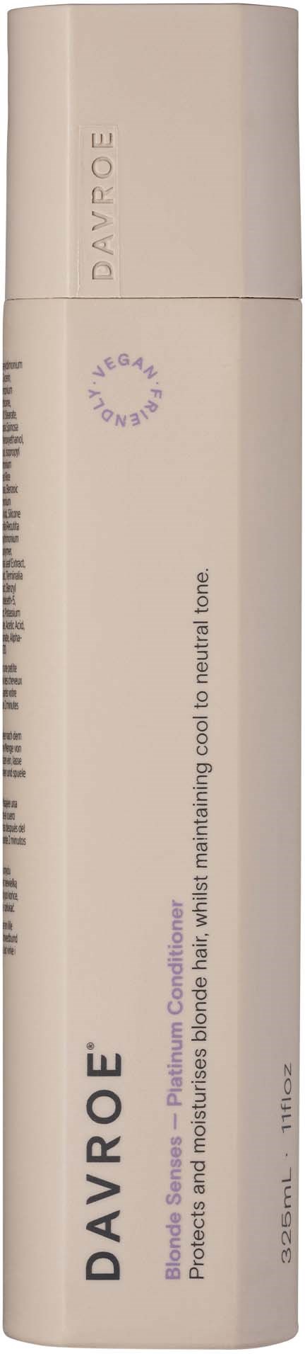 A white cylindrical bottle with a flip-top cap, labeled 'DAVROE' and describing hair care for cooling and moisturizing.