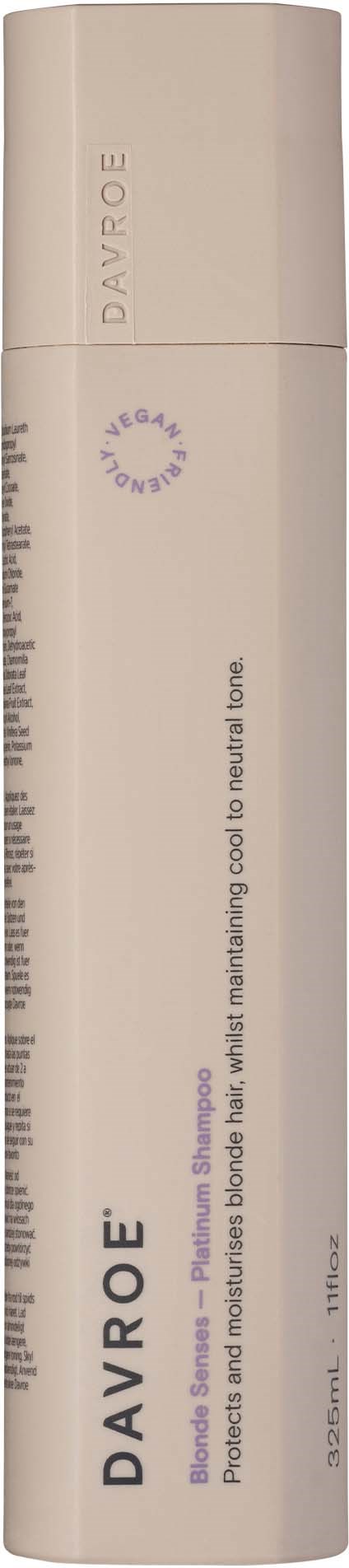 A beige cylindrical bottle with a white cap and black text label, likely a skincare or cosmetic product.