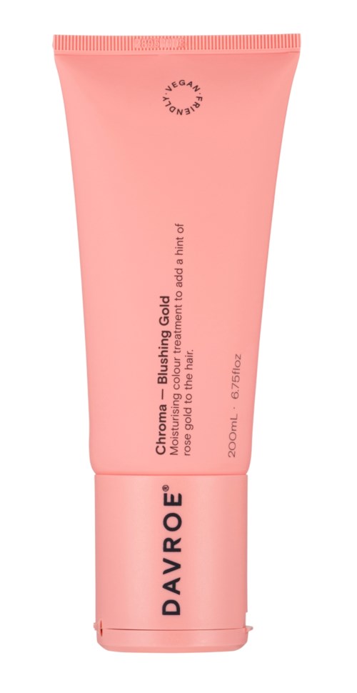 En rosa tube med DAVROE Chroma Blushing Gold ansikts- og kroppsfoundation. Den inneholder 200 ml og brukes til hudmaling.