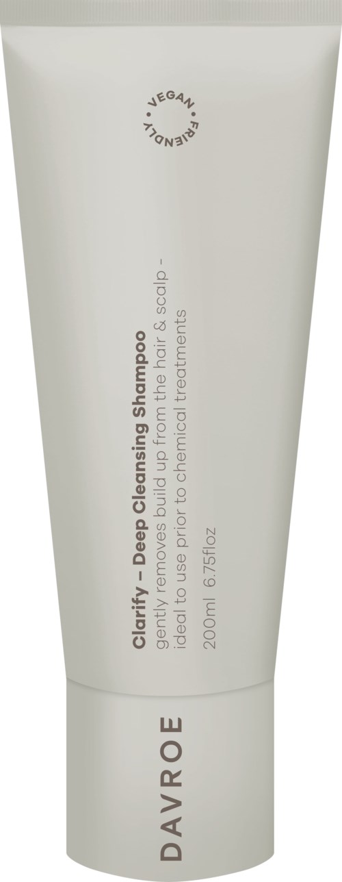 White tube of Davroe Clarify deep cleansing shampoo with vegan label and product details on it.