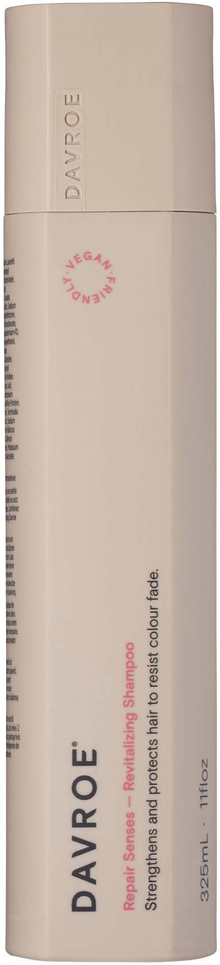 Eine weiße Sprühflasche mit beigem Deckel von DAVROE, gekennzeichnet für Styling und Haarfinish.