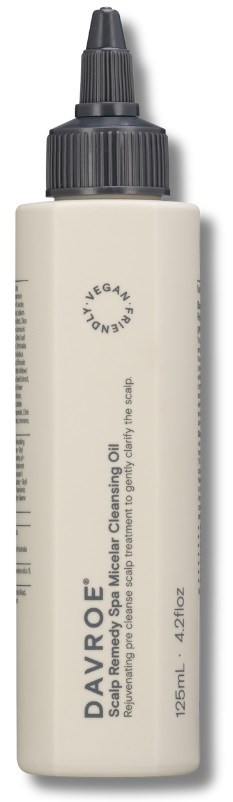 A white bottle with a black nozzle, labeled as vegan cleansing oil for skin, 125ml size.