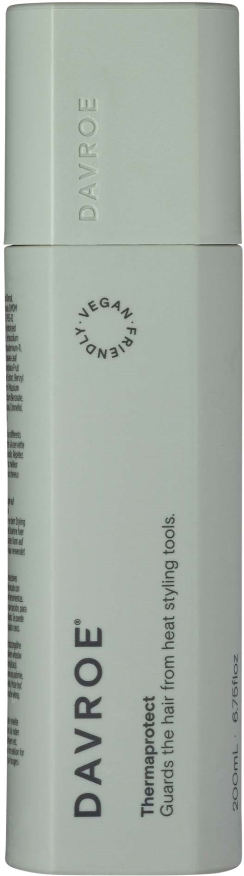 A light green aerosol can labeled DAVROE and stating it is a heat styling spray product.