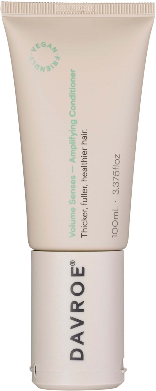 Eine weiße Tube Davroe Conditioner mit grüner und schwarzer Schrift, für dickeres, gesünderes Haar, 100 ml.