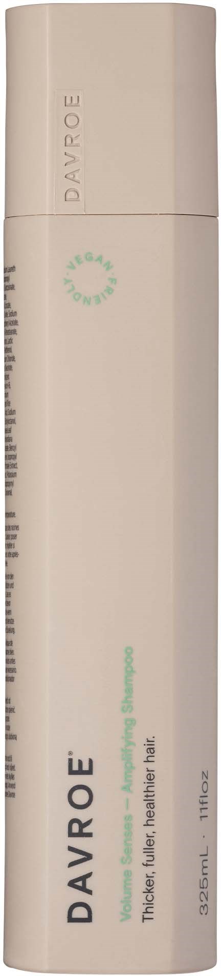 A white cylindrical bottle with green and black text, labeled 'DAVROE'. It appears to be a hair care product.