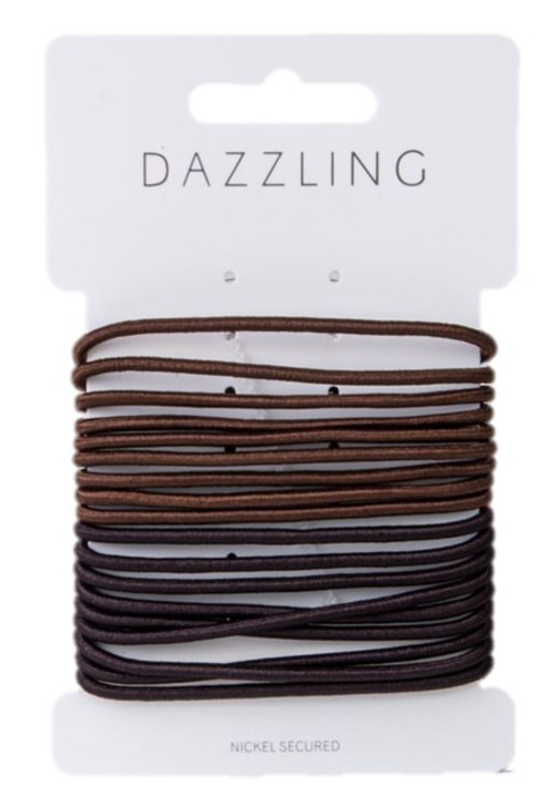 Ett set av bruna och svarta hårband på ett vitt kort märkt 'Dazzling' med orden 'Nickel Secured'.