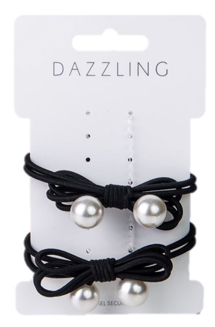 To svarte hårstrikker med store perlepynt. Merket "Dazzling" står øverst.