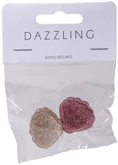 Two glittery heart-shaped jewelry pieces in gold and pink inside a clear plastic bag.