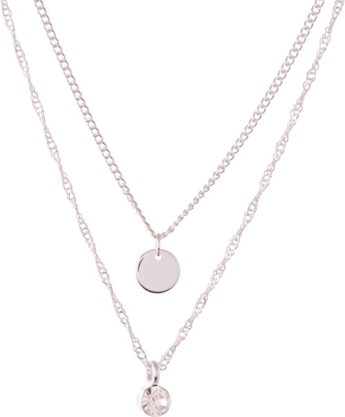 Twee lagen zilveren kettingen, een met een ronde hanger en de andere met een kristal. Eenvoudige en elegante sieraden.