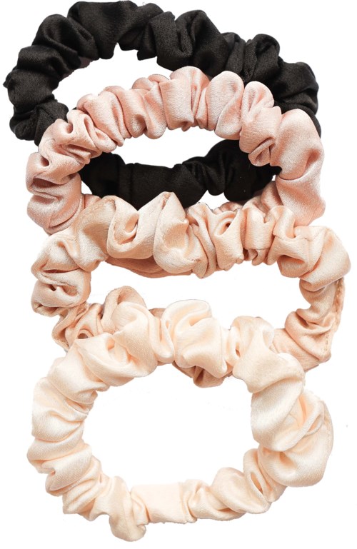 Ett set med fem tygghårband i svart, rosa, beige och krämfärgade staplade ovanpå varandra.