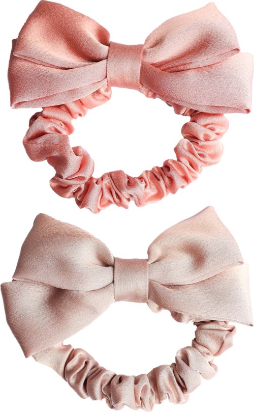 Two pink fabric hair ties with large bows, one darker and one lighter, each with a matching scrunchie.