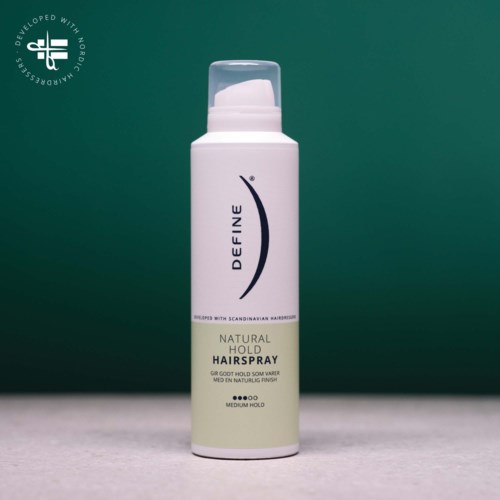 A white aerosol spray titled Define Natural Hold Hair Spray, with a green background and a clear cap.