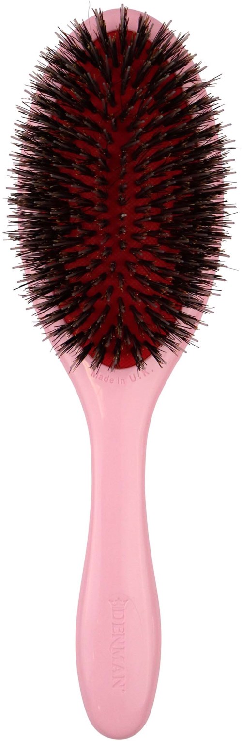 Eine rosa Haarbürste mit schwarzen und roten Borsten, ovale Form und Griff.