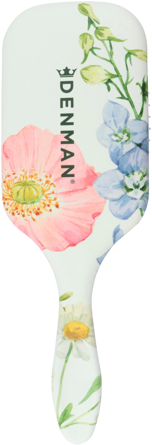 Eine Haarbürste mit Pastellblumen und dem Markennamen DENMAN.