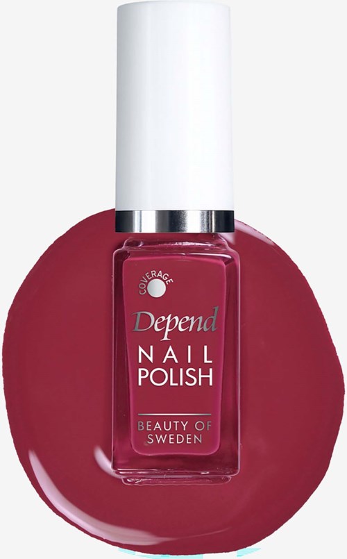 A bottle of Depend nail polish in a deep red shade on top of a matching red nail polish pool.