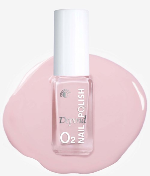 Pink nail polish bottle with a white cap, spilled on a surface. Suitable for nail decoration.
