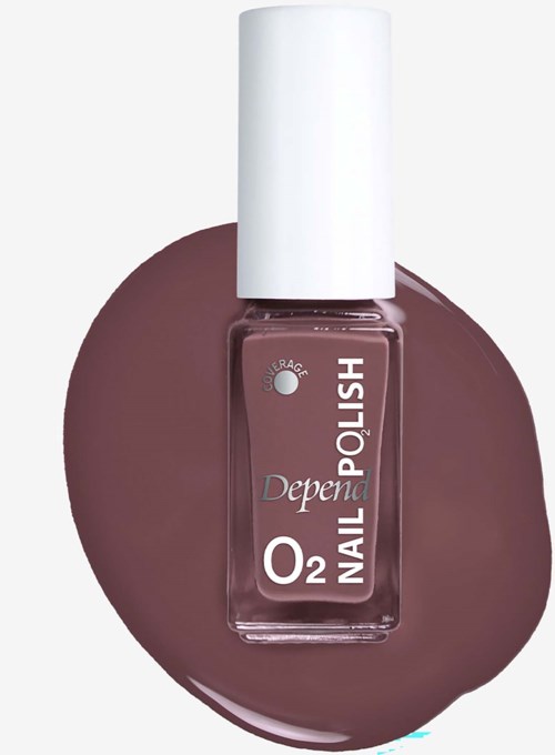 Nail polish bottle labeled Depend O2 Nail Polish in a muted purple shade, with a white cap, lying on matching purple nail polish.