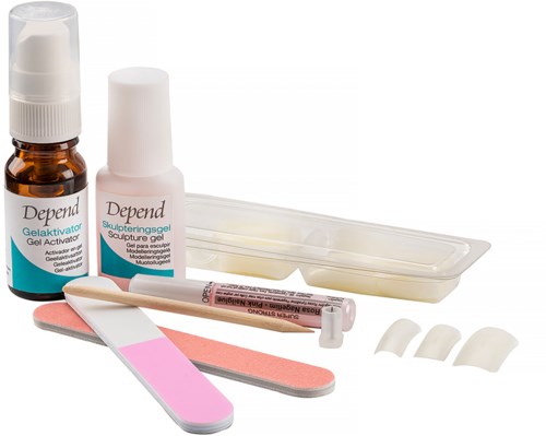 Nail care items including gel activator, sculpting gel, nail file, tips, and a tray.