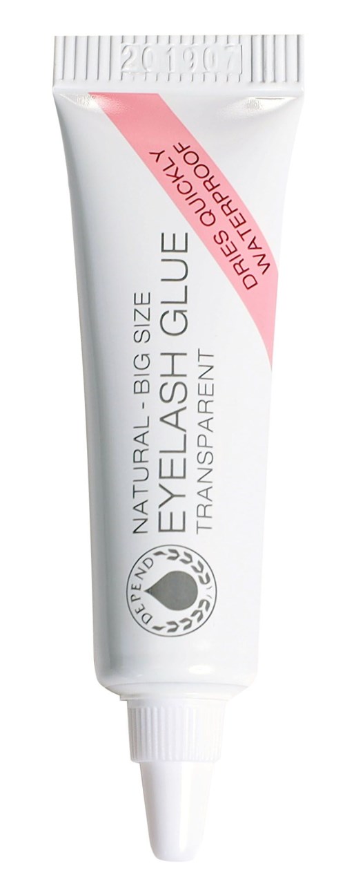A white tube of eye lash glue with a pink label and black text, indicating it is transparent and big size.
