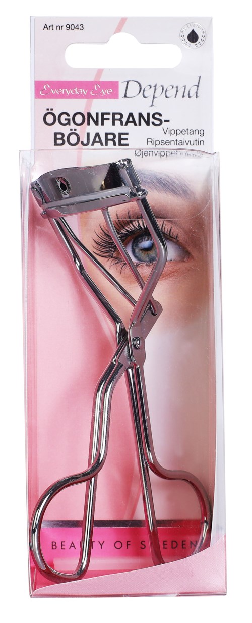 A metal eyelash curler in clear packaging with a close-up eye image on the background.