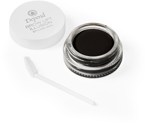 A jar of black brow lift illusion wax with a small brush lying next to it.