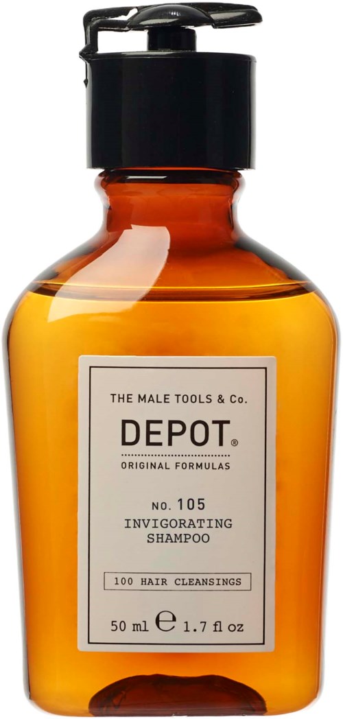 En bägare i bärnstenfärgad plast med svart pump innehåller uppiggande schampo från The Male Tools & Co. Depot. Den är 50 ml.