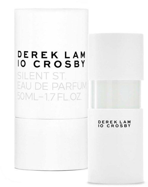 A white perfume bottle with black text and a matching box, both labeled with the name Derek Lam 10 Crosby.
