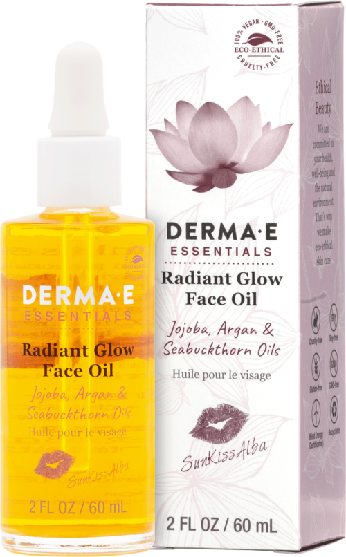 Een kleine fles met gele gezichtsolie met pipet en een roze-witte doos, beide gelabeld 'Radiant Glow Face Oil' met lotus bloem afbeelding.