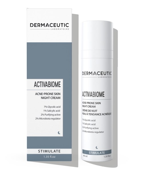 A skincare product box and bottle for acne-prone skin nighttime cream, labeled Dermaceutic Activabiome, 1.35 fl oz. and 40 ml.