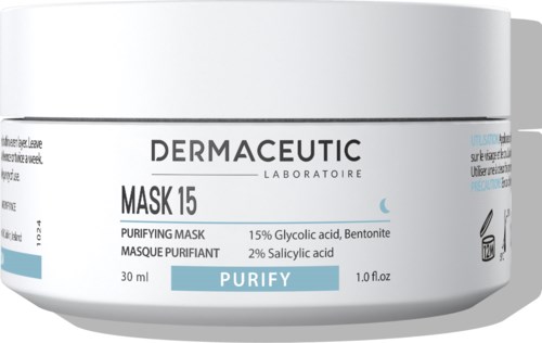 A white jar with black and blue text, labeled 'DERMACUTIC' and 'MASK 15,' indicates it is a skincare purifying mask container.
