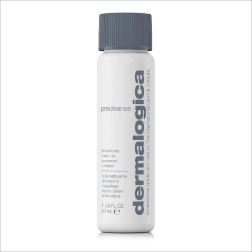 A small white bottle with a gray cap, labeled Dermalogica precleanse for removing makeup, sunscreen, and debris.
