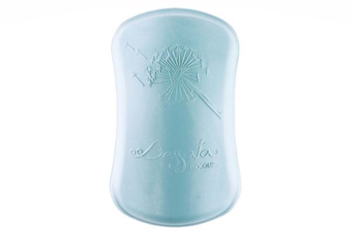 Light blue soap with a dandelion design and the word 'Sevava' on it.