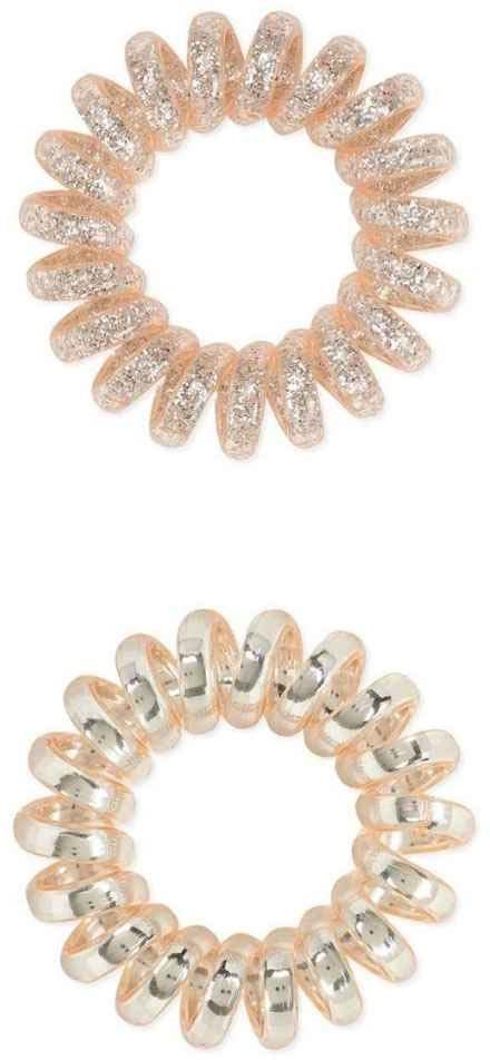 Two elastic hair ties, one with pink glitter and the other with silver metallic beads.