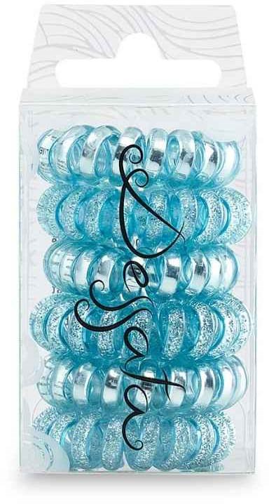 Small blue hair clips in a clear plastic box with decorative writing.