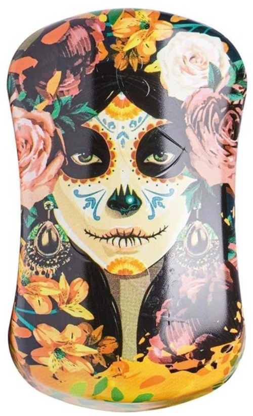 Colorful illustration of a woman with sugar skull makeup, wearing earrings, surrounded by flowers.