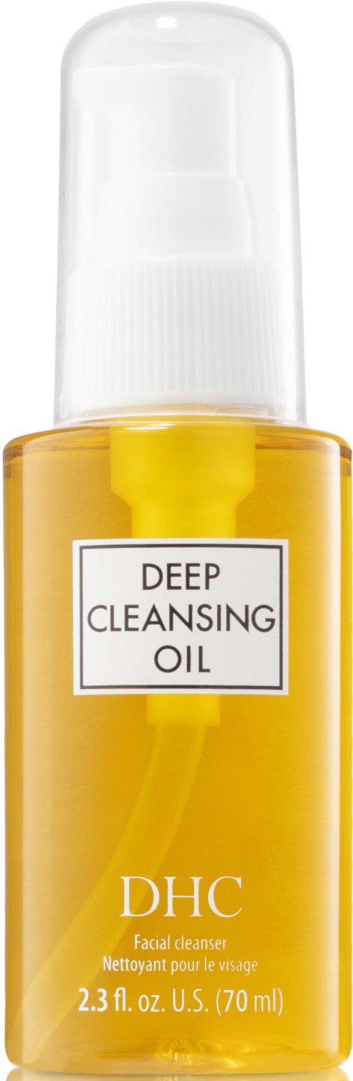 En gul flaska märkt 'Deep Cleansing Oil' med spraypump och genomskinlig lock.