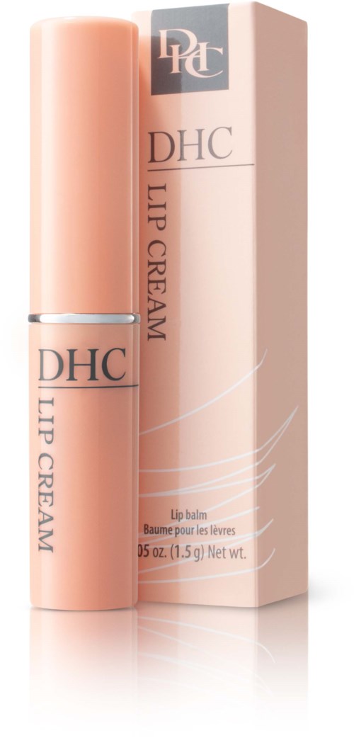 A small peach-colored lip balm tube next to a box with similar colors, labeled DHC Lip Cream.