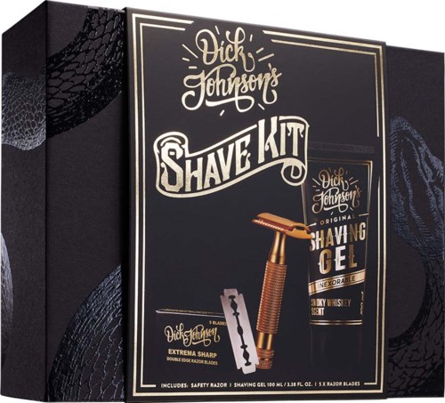 A grooming kit with shaving gel, razor, and blades in a black box with decorative text and design.