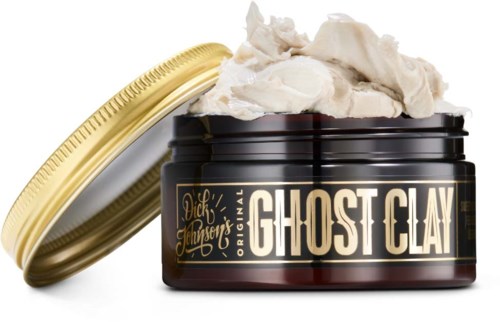 A jar of Ghost Clay with white clay spilling over the open lid.