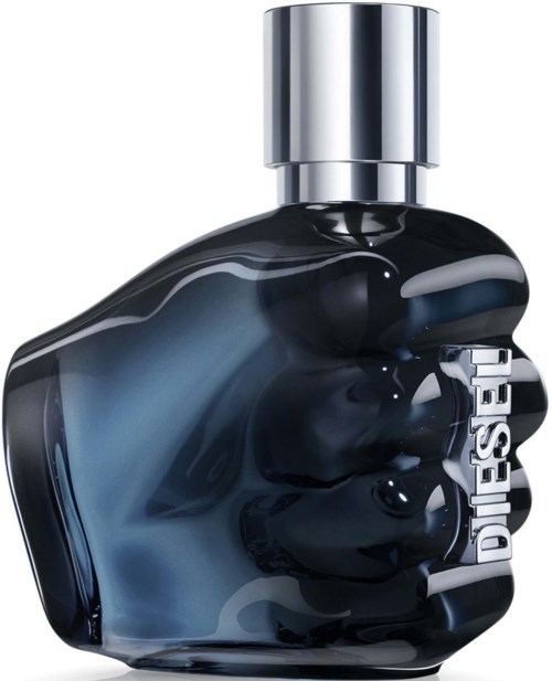 A dark perfume bottle shaped like a clenched fist with a silver cap and the word DIESEL on the ring.
