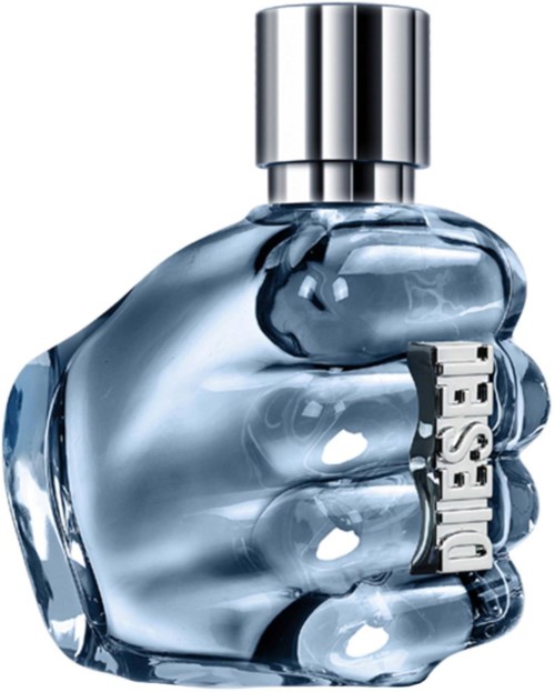 A hand holding a glass perfume bottle labeled Diesel with a silver cap.
